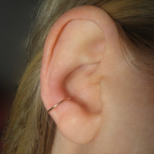 brass-ear-piercing