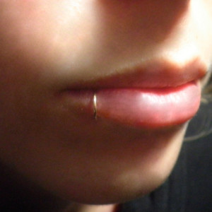 gold fake lip piercing